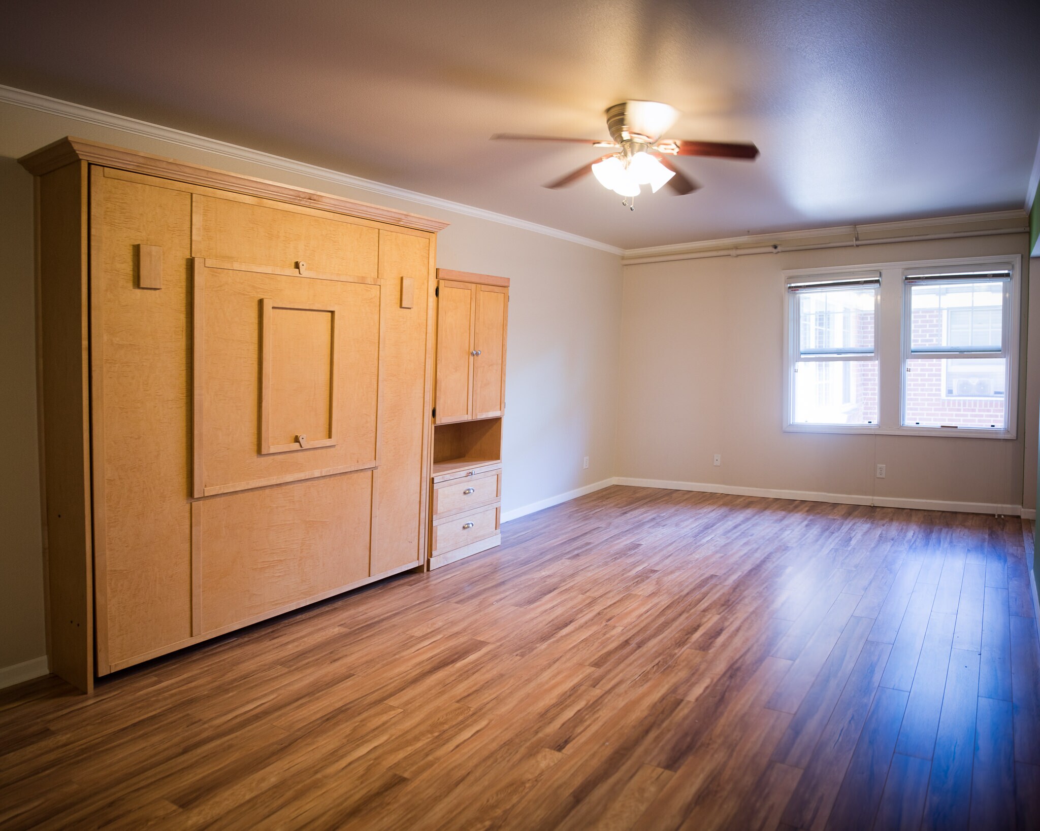 Murphy bed closed in main room - 701 NE 28th Ave