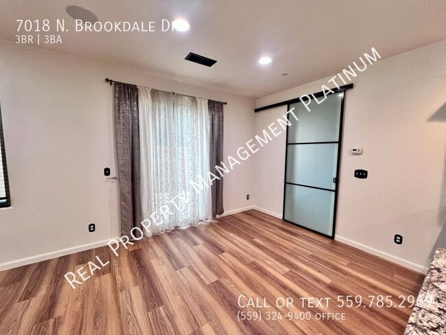 Building Photo - 7018 N Brookdale Dr