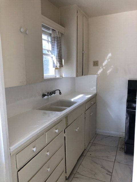 Kitchen with new tile glazing - 10516 Blythe Ave