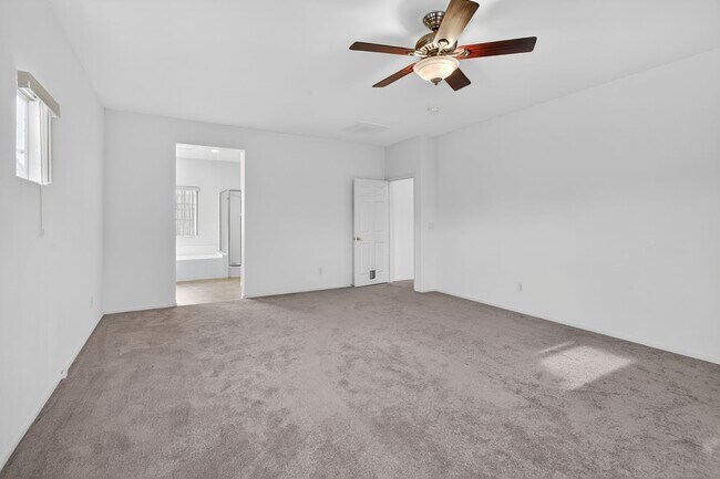 Building Photo - CORNER LOT 4-BEDROOM HOME + LOFT  WITH 3.5 BATHS AND 3-CAR GARAGE!