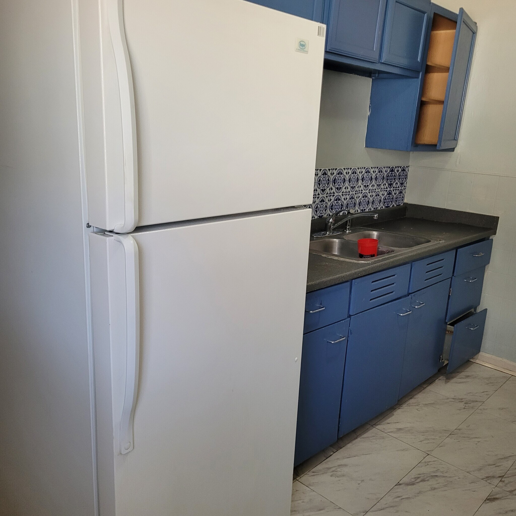 Refrigerator in kitchen - 1612 S Hughes St