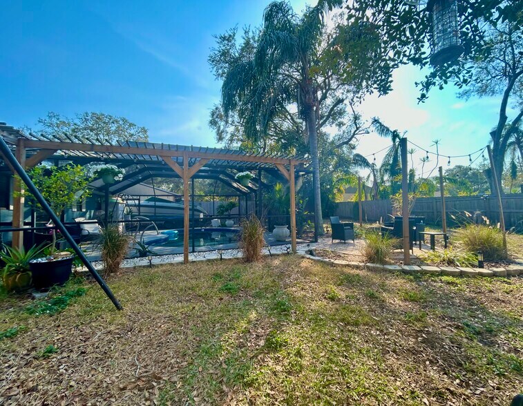 Spacious yard with paver fire pit - 9383 86th Ave