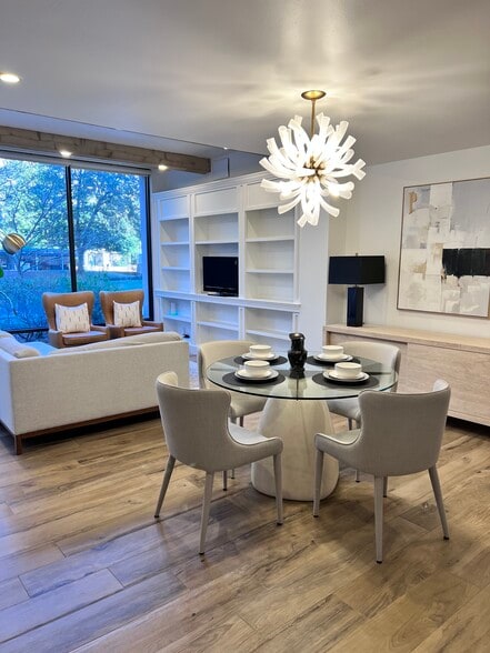 Open concept with sight lines from the dining room to the living room and kitchen - 3530 Piedmont Rd NE