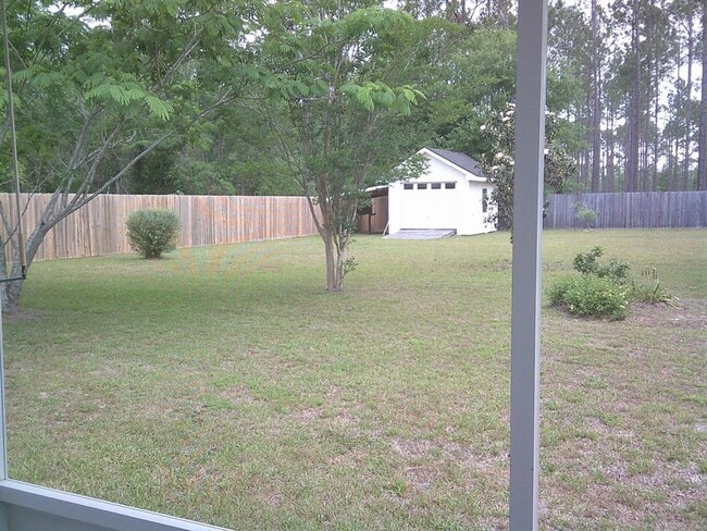 Building Photo - Spacious 3BR Home with Screened Porch, Fenced Backyard & Wired Shop in North Valdosta