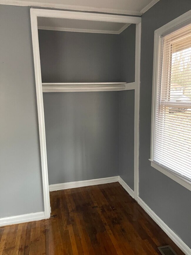 Building Photo - 3bed house in the county! Central all electric hvac, laundry, yard and hardwoods.