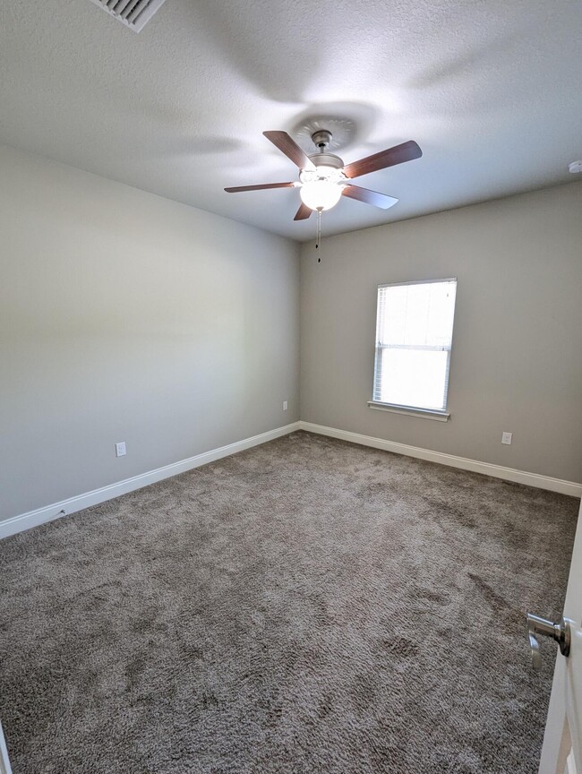 Building Photo - 8934 E River Dr