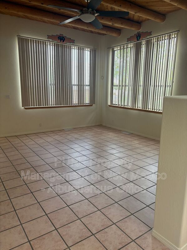 Building Photo - 8220 W Raintree Dr NE