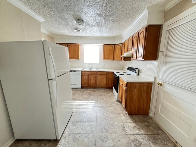 Building Photo - Denton Charmer with Big Yard, Carport & Flexible Living Space