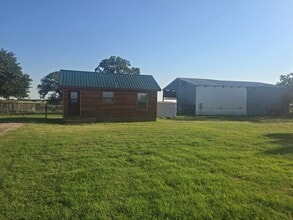 Building Photo - Specials!!! 1/1 LOG CABIN + 2 HORSE PROPERTY with Yard in BROCK