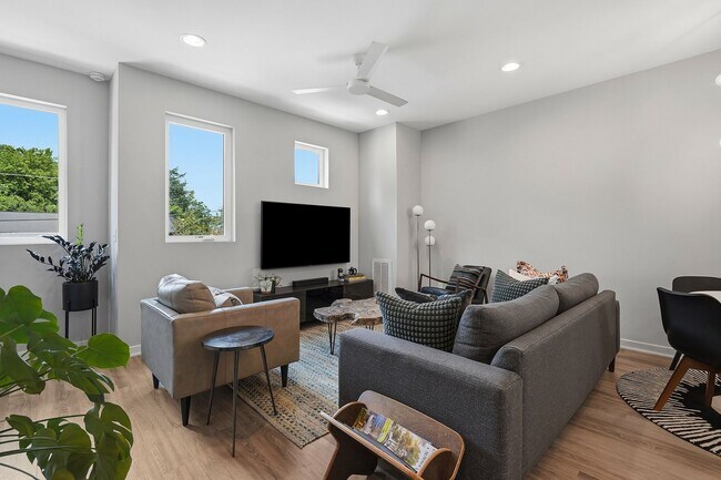 Building Photo - Live Elevated in Downtown Raleigh – Stunning Townhome with Rooftop Oasis!