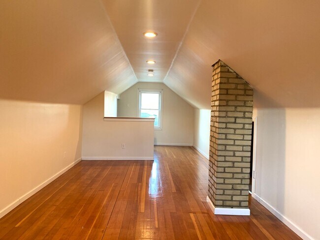 Building Photo - Three bedroom home with beautiful hardwood floors and central air!