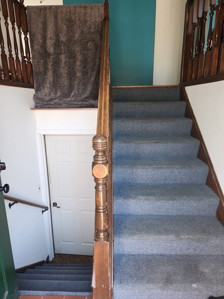 Stairs leading to downstairs apartment - 2116 Thaler Ave