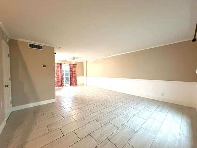 Building Photo - Modern Medical Center Gem with Stylish Upgrades & Private Patio Living