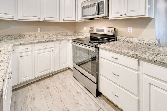 Building Photo - 120 N Ranchwood Blvd