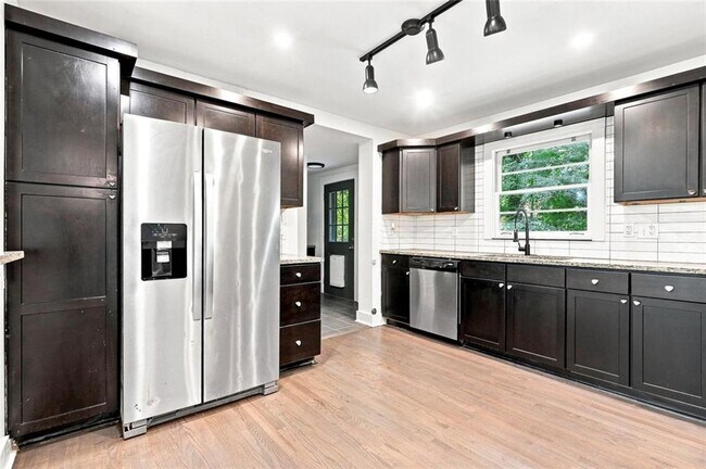 Building Photo - 5012 Tilly Mill Rd