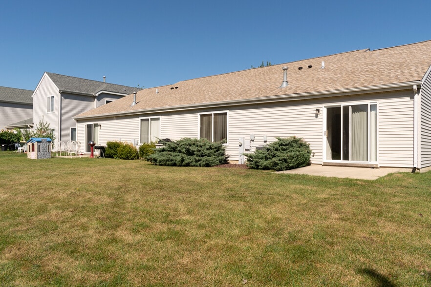 Backyard Looking to Backdoor - 61 W Providence Ln