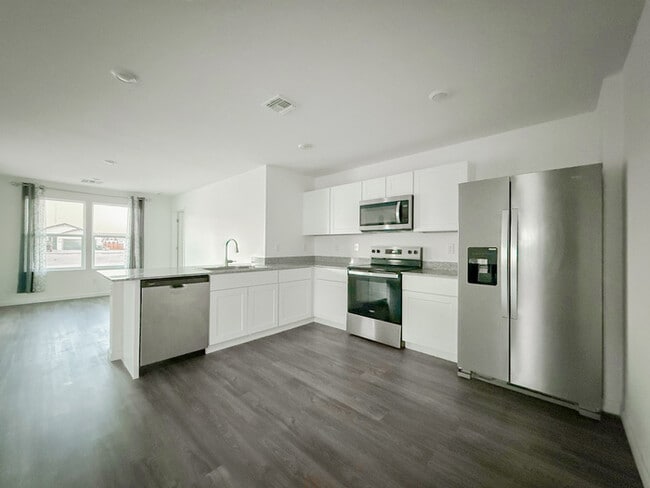 Building Photo - 8693 W Valdez Dr