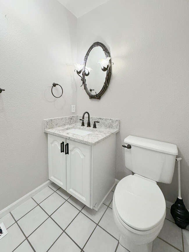 Main Floor Bathroom - 9927 Prairie Falcon Ct