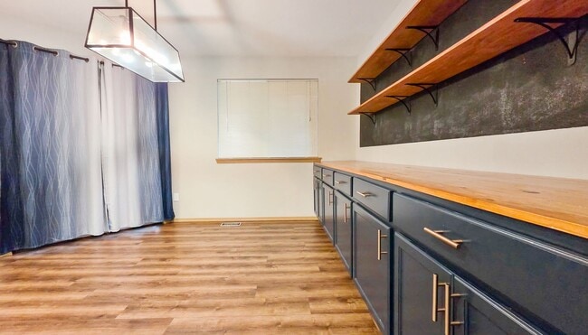 Building Photo - Updated 4-Bed Home Near Future Light Rail ...