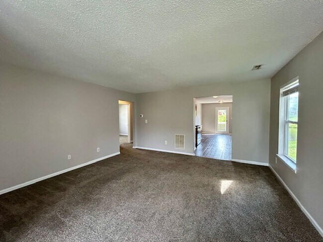 Building Photo - Beautiful 3 Bedroom 2 Bath Ranch On A Pond...