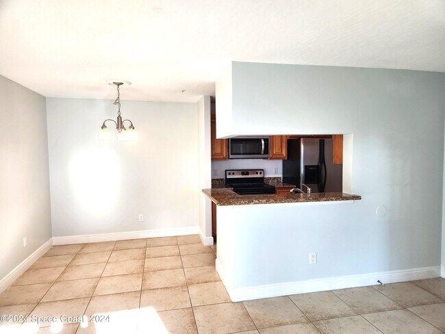 Building Photo - 7667 N Wickham Rd