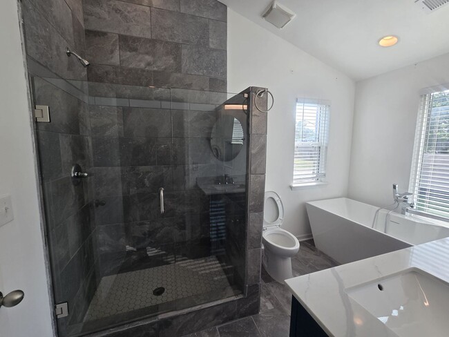 Building Photo - Welcome to The Buchanan Retreat – Modern 4...
