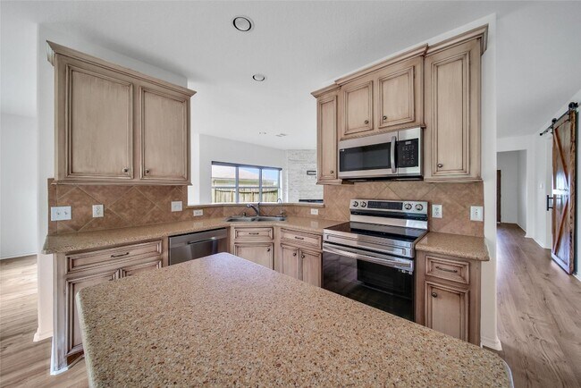 Building Photo - 15575 Kitty Hawk Dr