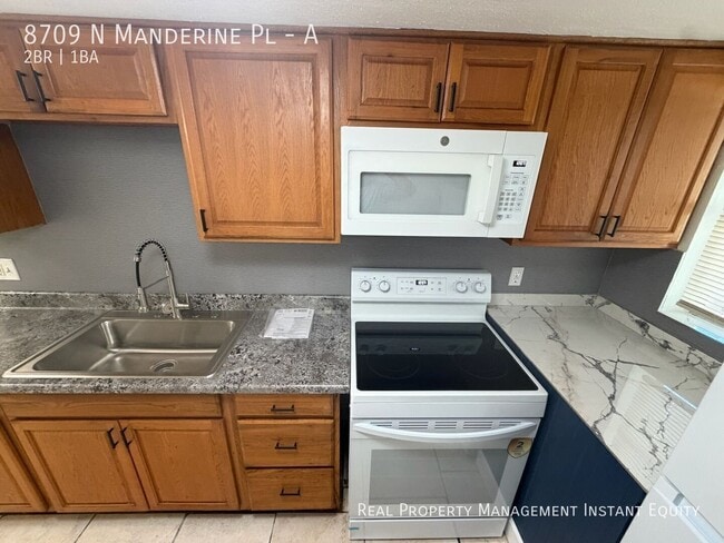 Building Photo - 8709 N Mandarine Pl