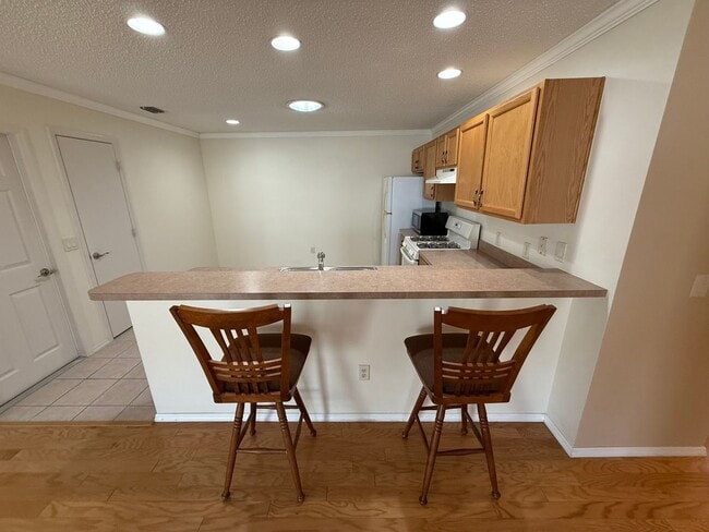 Building Photo - ANNUAL Rental in The Village of Piedmont - UNFURNISHED - 2 Bedroom 2 Bath Patio Villa, with pond ...