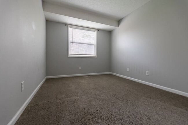 Building Photo - **Charming 3-Bedroom Home with Spacious Ya...