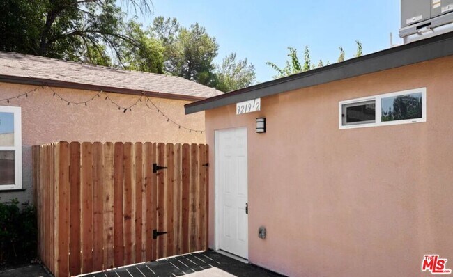 Building Photo - 9219 Langdon Ave