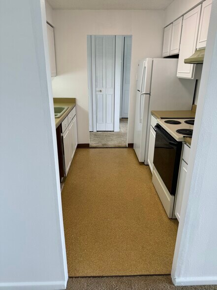 Kitchen from the Dining Room - 411 Lakewood Cir