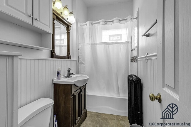 Building Photo - Furnished 2-Bedroom Second-Floor Apartment Near Elmwood Village