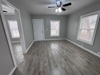 Building Photo - Remodeled 2 bedroom, 1 bathroom house with fenced yard and garage