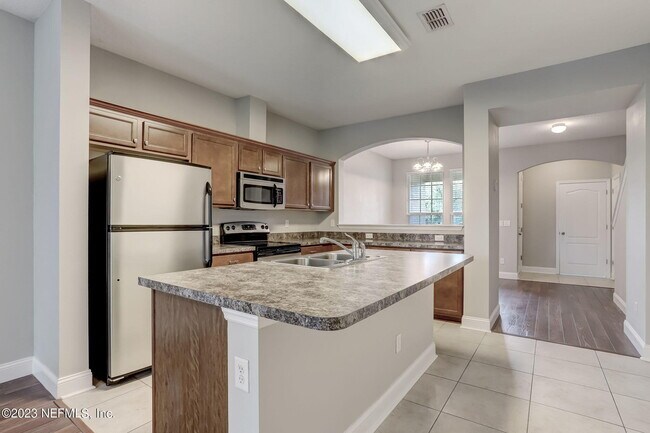 Building Photo - 4220 Plantation Oaks Blvd