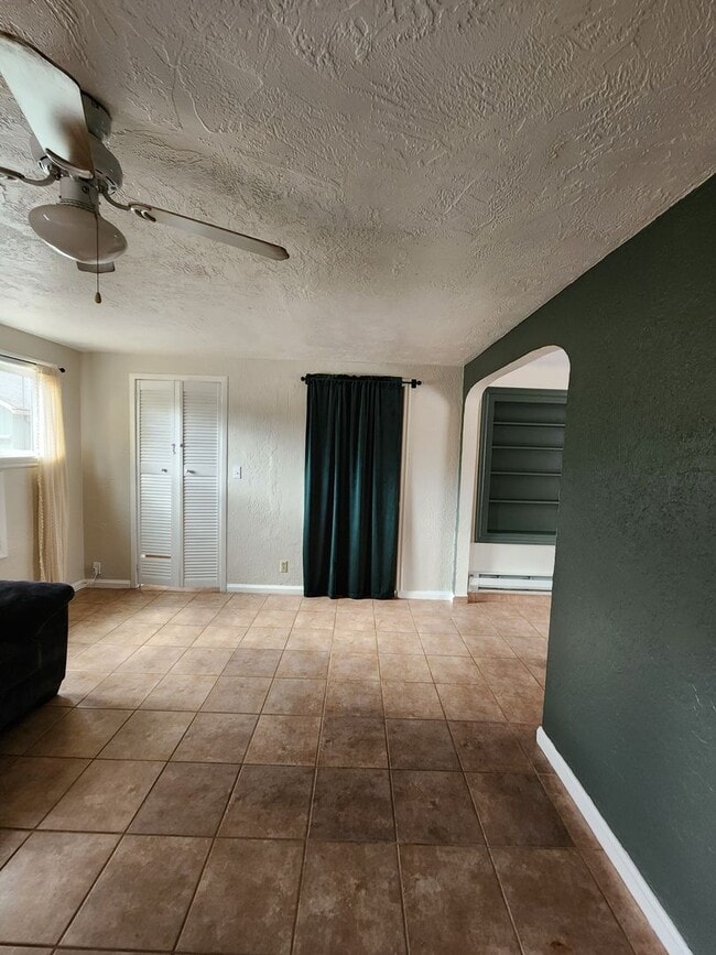 Building Photo - Upstairs Apartment Above Holly Market