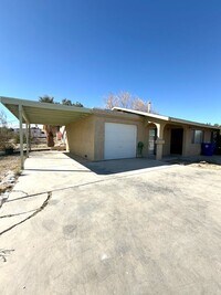 Building Photo - 2 Bedroom, 2 Bathroom with a Garage and Carport