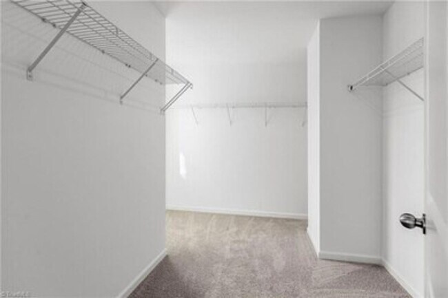 Building Photo - Spacious 3-Bedroom Townhome with Private Patio, Central HVAC & In-Unit Laundry Hookups