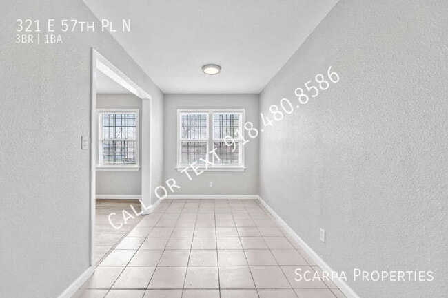Building Photo - 321 E 57th Pl N