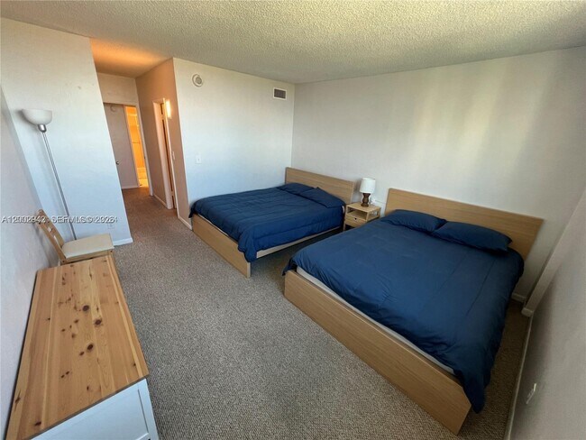 Building Photo - 19380 Collins Ave