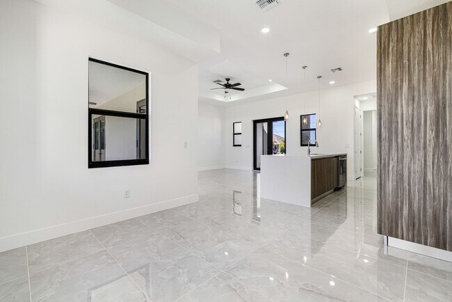 Building Photo - Brand-New Coastal Retreat | 4BR Home in NW Cape Coral