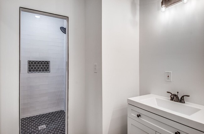 Building Photo - Live Stylishly. Live Comfortably. Live Mem...