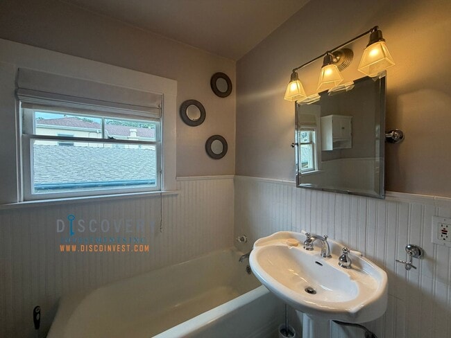 Building Photo - Lakeshore Craftsman with Detached Cottage and Versatile Bonus Rooms