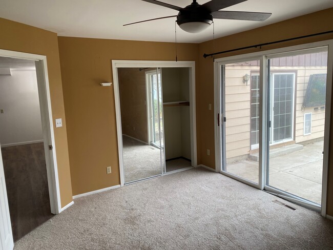 BEDROOM WITH PATIO ACCESS - 2909 Sussex Ln