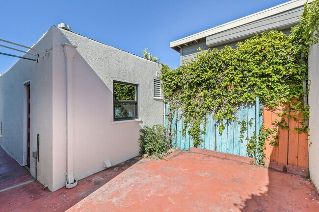 Building Photo - Move In Special!!  Elevated Golden Hill 2BR with Southwesterly Views with A/C & Detached Garage