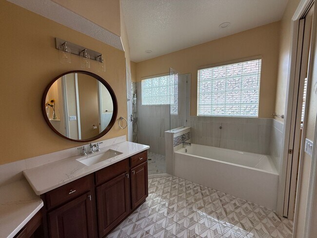 Building Photo - Luxurious 4 Bedroom 3 Bath Lakefront Pool Home W/3-Car Garage