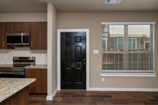 Building Photo - GORGEOUS 2 BEDROOM FOUR PLEX LOCATED IN MI...