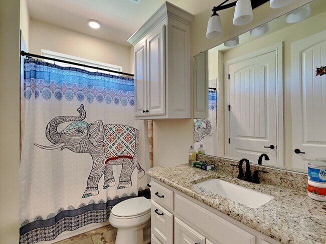 Building Photo - Experience Resort-Style Living in the Prestigious Gated Community of Bella Flora.