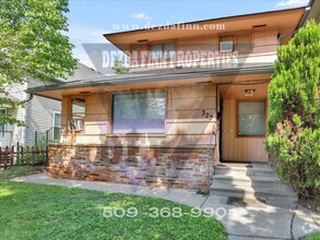 Building Photo - Charming Multi-level Home in Logan/GU Neig...