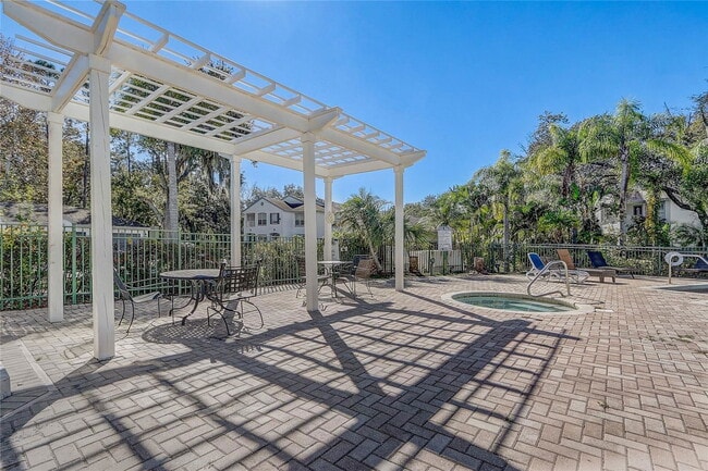 Building Photo - Seurat Street, Orlando, FL 32819 - 4 BR 2 BA condo